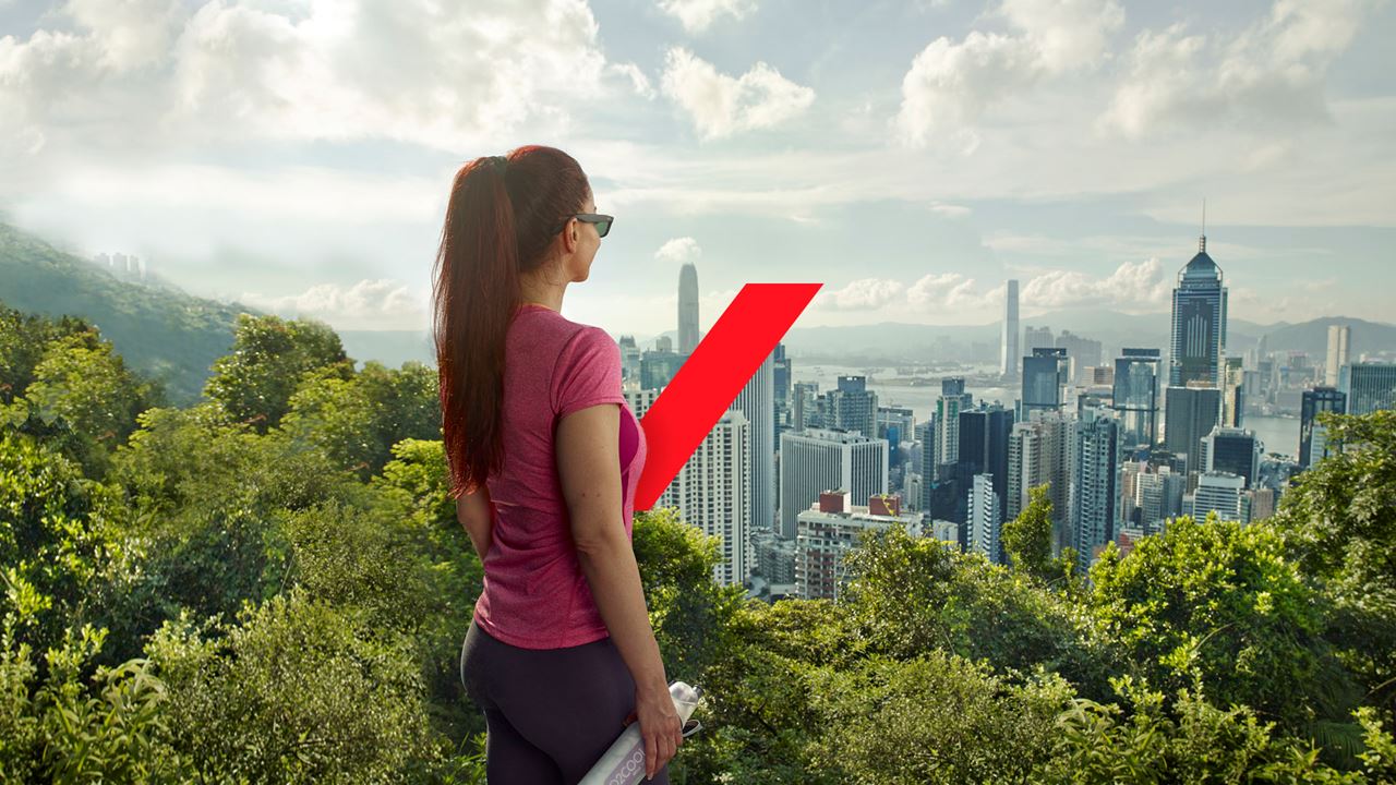 Lady overlooking city with red AXA switch.