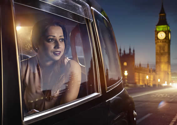 Woman in taxi with Big Ben in the background