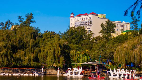 photo over the water of Burnham boats in the english countryside